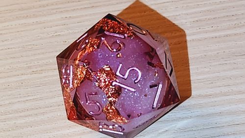 Customer photo review of URWizards D&D Wine Liquid Heart Resin Engraved Dice Set Copper Flakes
