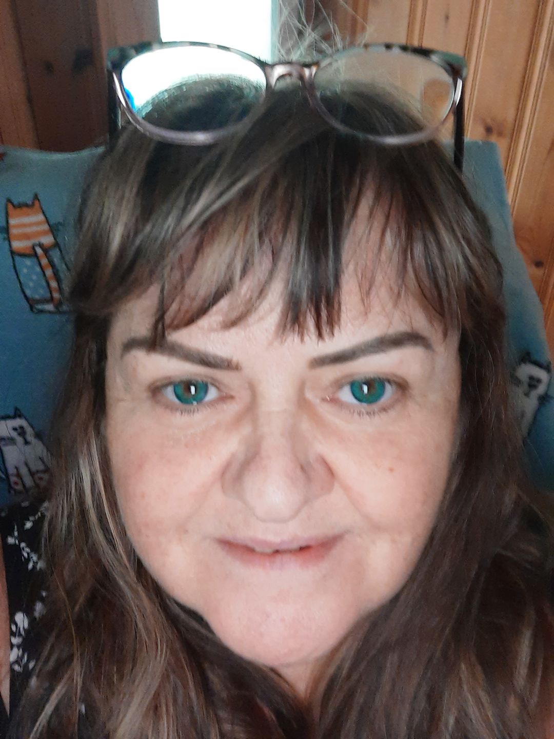 Customer photo review of Perla Blue Prescription Colored Contact Lenses