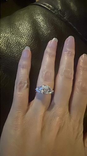 Customer photo review of Three Stone Radiant And Trillion Moissanite Polish Engagement Ring