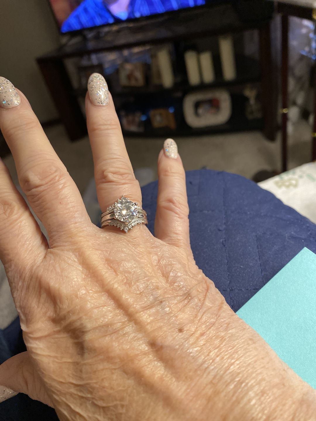 Customer photo review of Solitaire Moissanite With Enhancer Shank Bridal Engagement Ring Set