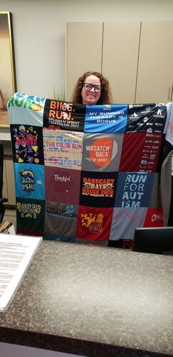 T-shirt quilt with running, community events themes by Leslie from UT