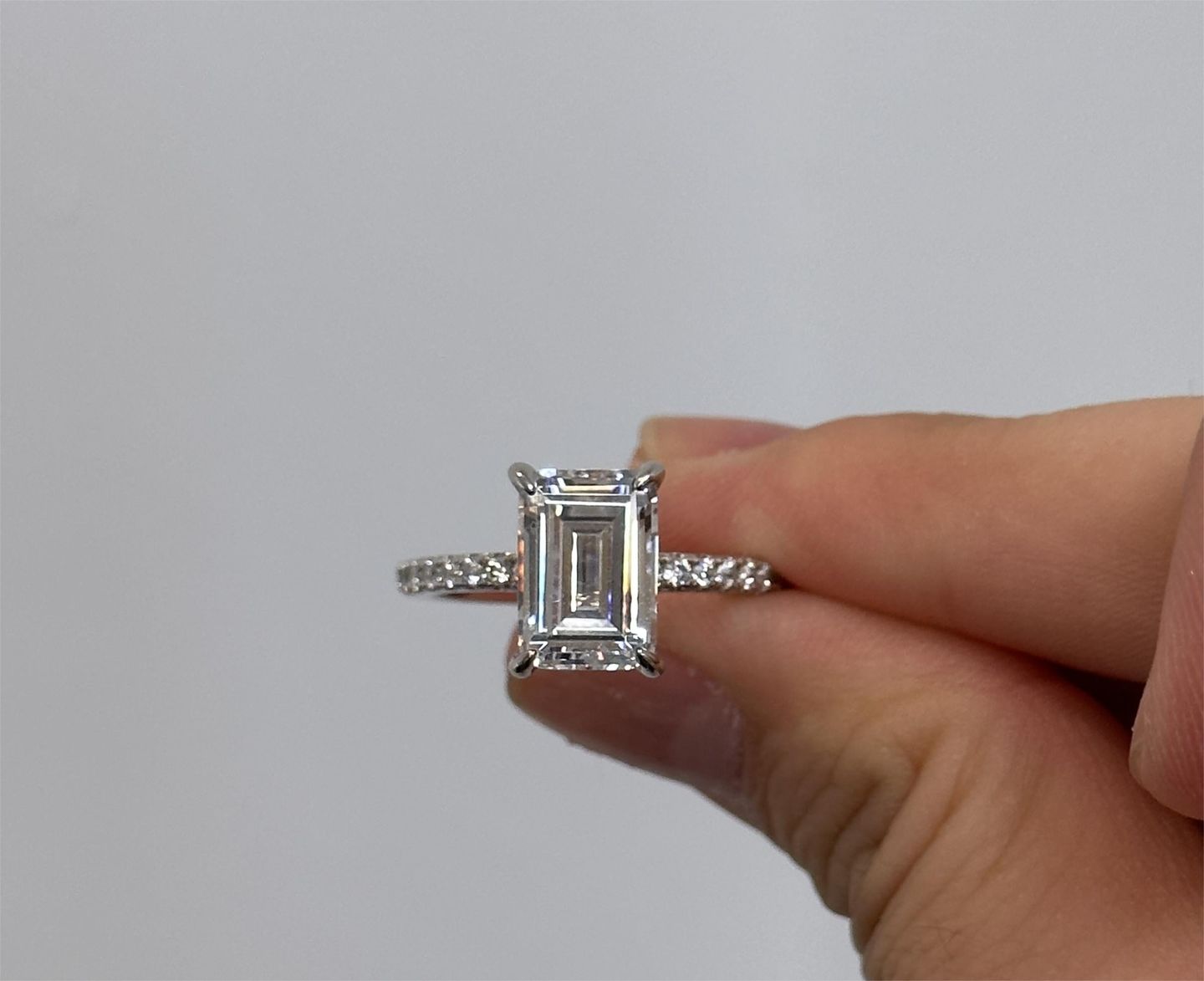 Customer photo review of Louily Classic Emerald Cut Engagement Ring In Sterling Silver