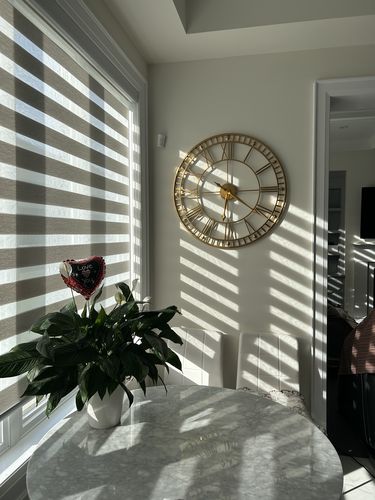 Customer photo review of 32" Gold Roman Numeral Metal Wall Clock - 82cm