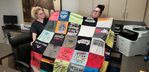 T-shirt quilt with food, fitness themes by Leslie from UT