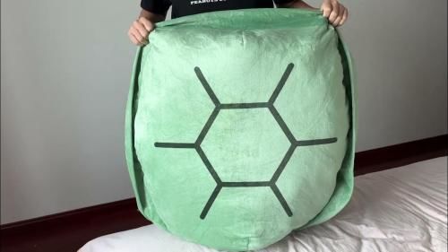Customer photo review of Puffy Wearable Turtle Plush