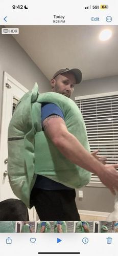 Customer photo review of Puffy Wearable Turtle Plush