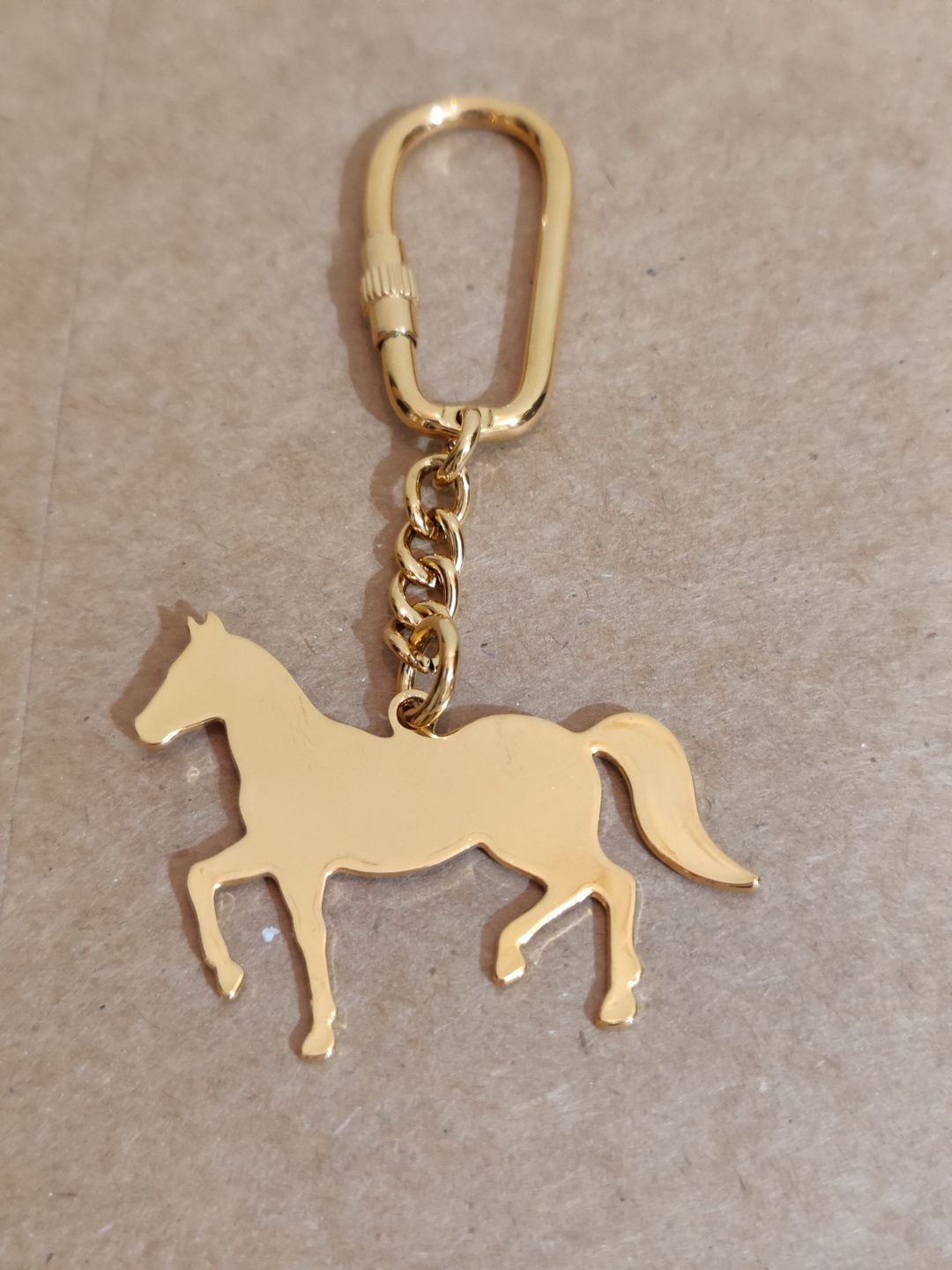 Customer photo review of Keychain Horse - Goldplated