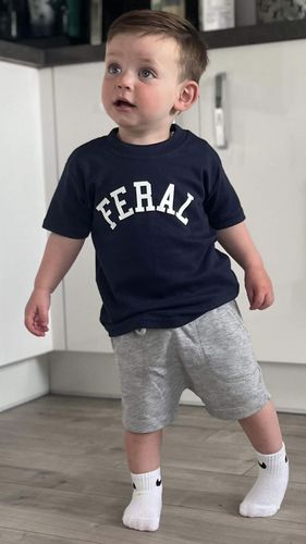 Customer photo review of FERAL College Kids Tee