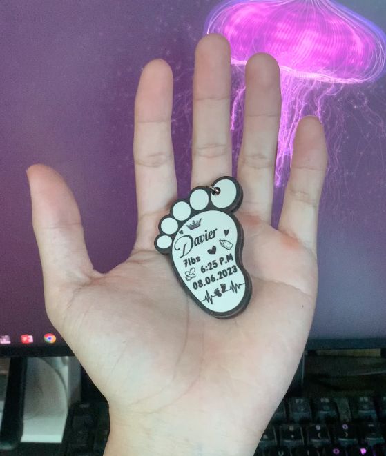 Customer photo review of Personalized New Baby Feet Wooden Keychain