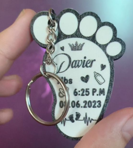 Customer photo review of Personalized New Baby Feet Wooden Keychain
