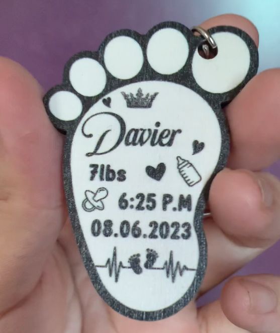 Customer photo review of Personalized New Baby Feet Wooden Keychain