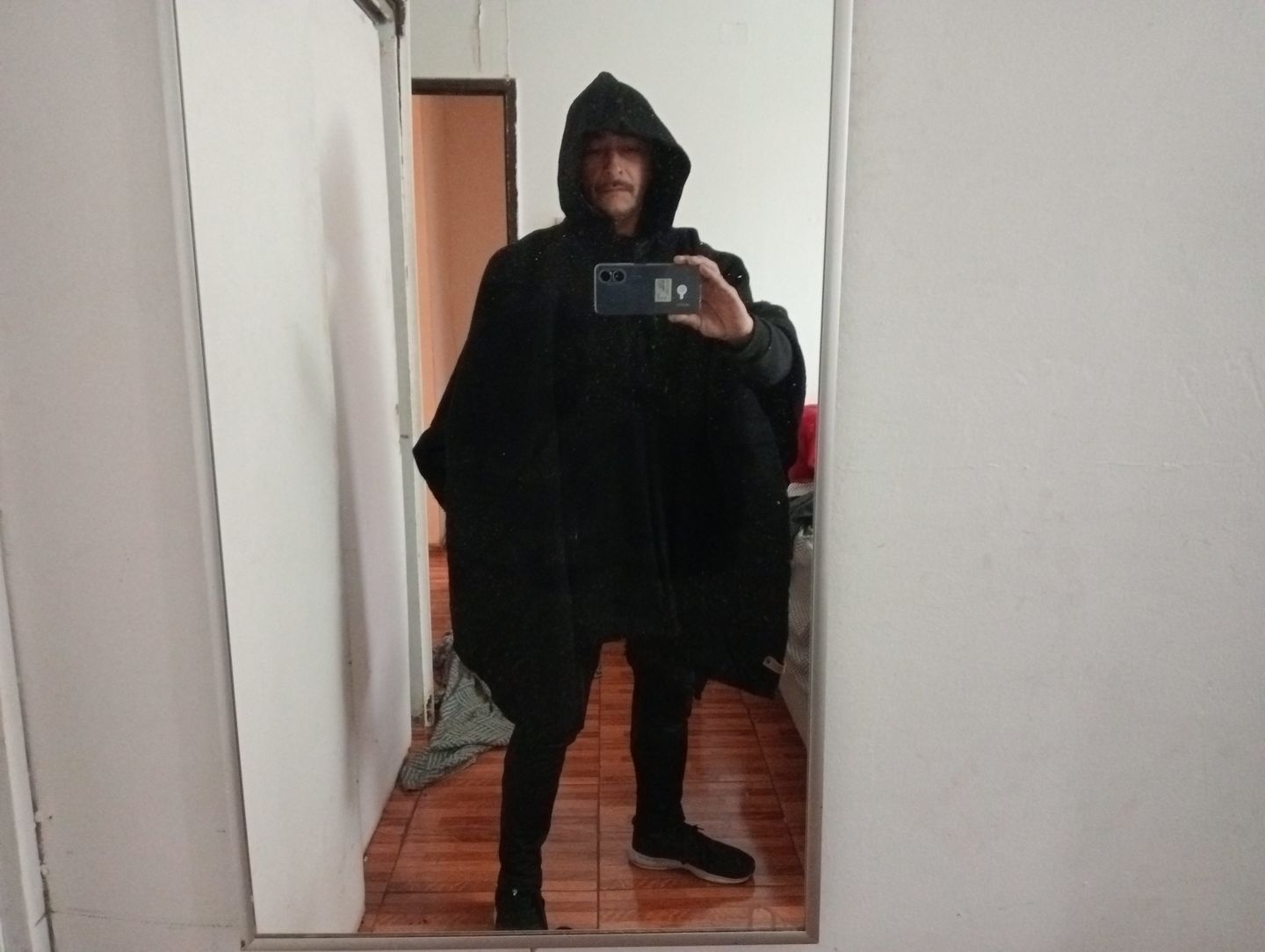 Customer photo review of PONCHO PREMIUM CLÁSICO NEGRO