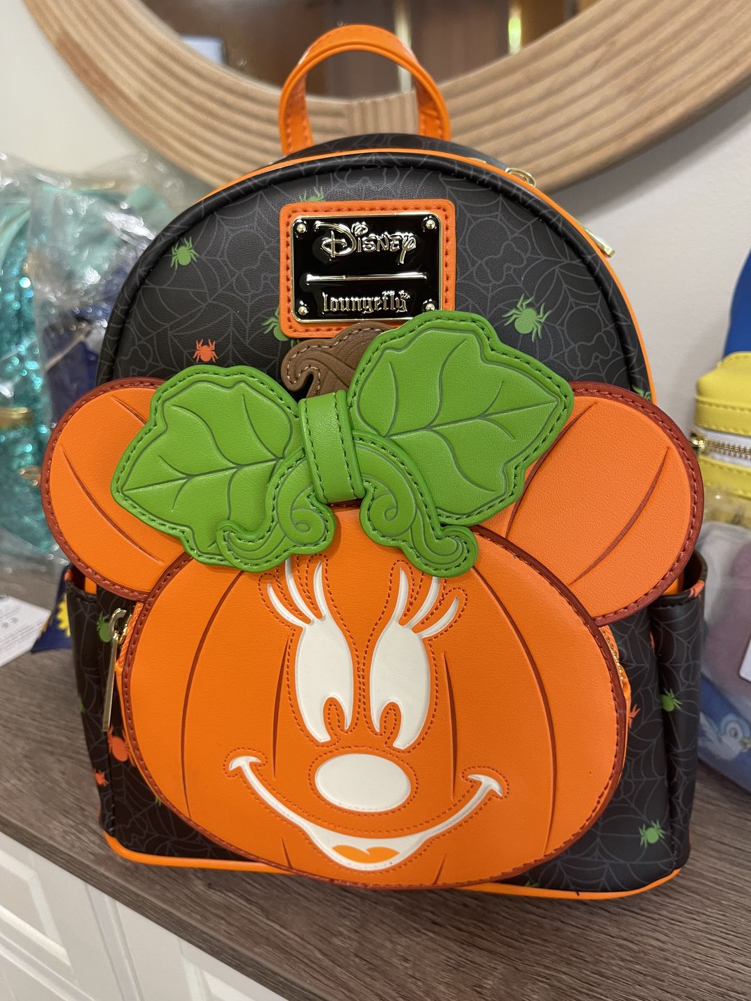 Customer photo review of 707 Street Exclusive - Loungefly Disney Glow in the Dark Pumpkin Minnie Mouse Mini Backpack