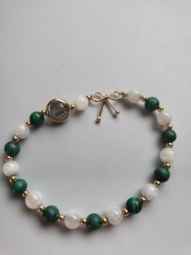 Customer photo review of Bracelet Anti-Douleurs en Malachite et Pierre de Lune | Or fin