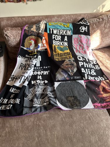 T-shirt quilt with music, social justice themes by Melanie from PA