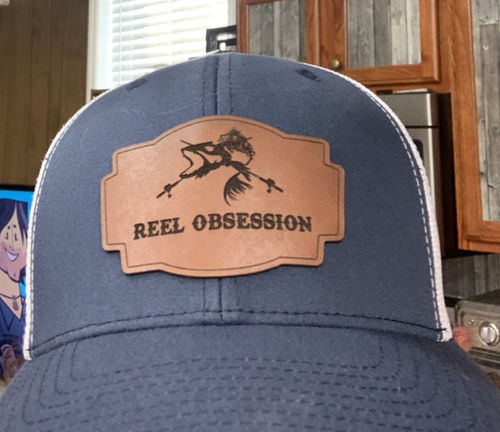 Customer photo review of Custom Leather Patch Trucker Hat - Yupoong 6606