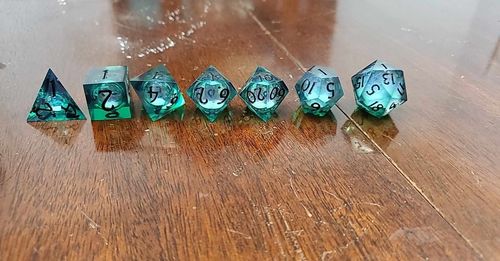 Customer photo review of Green Liquid Core Resin Moon DnD D&D Dice Set