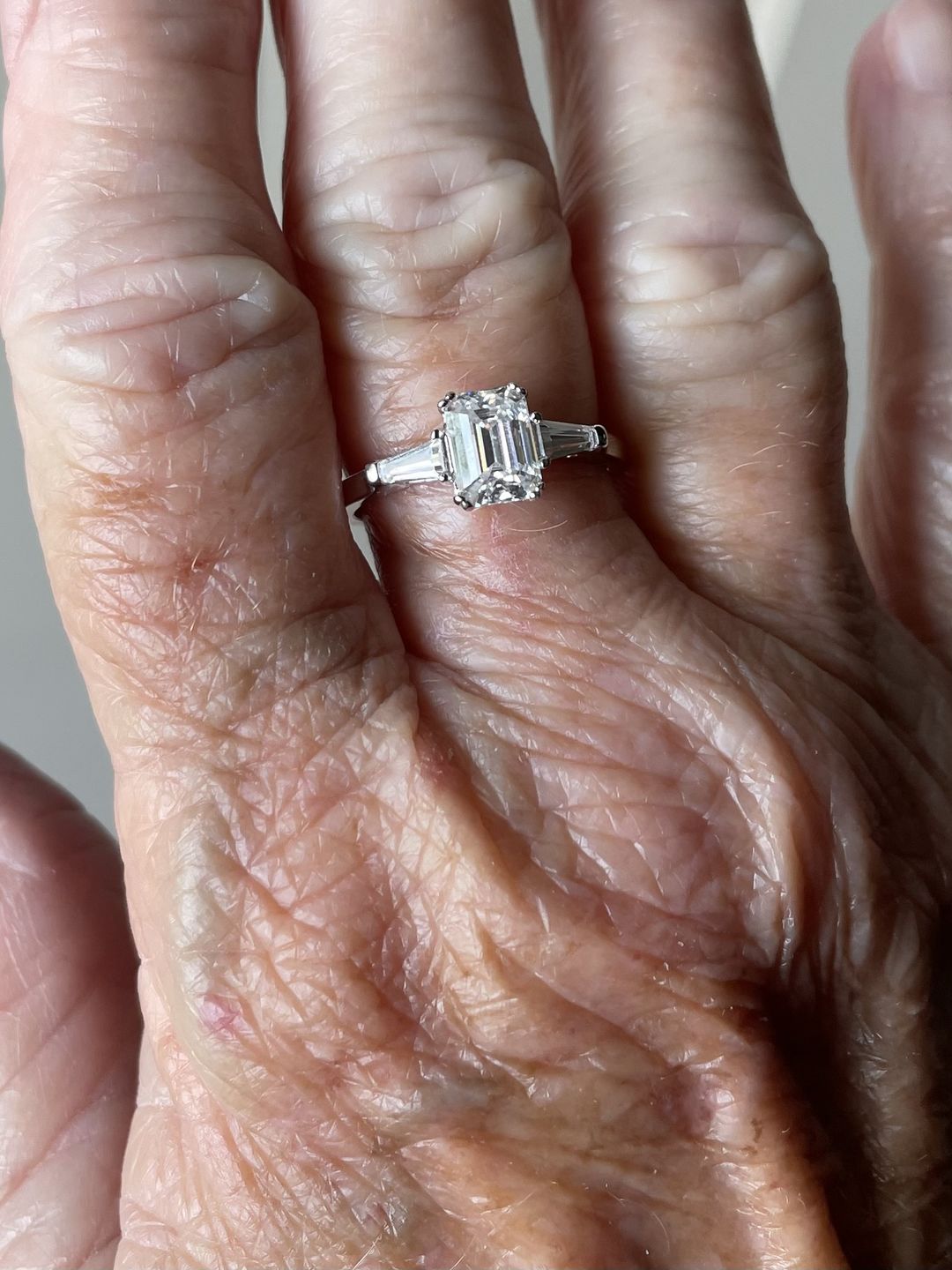 Customer photo review of Three Stone Emerald Cut Moissanite Tapered Baguette Engagement Ring
