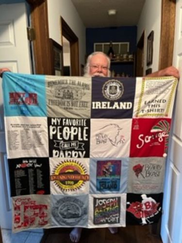 T-shirt quilt with travel, family themes by Leslie from MO