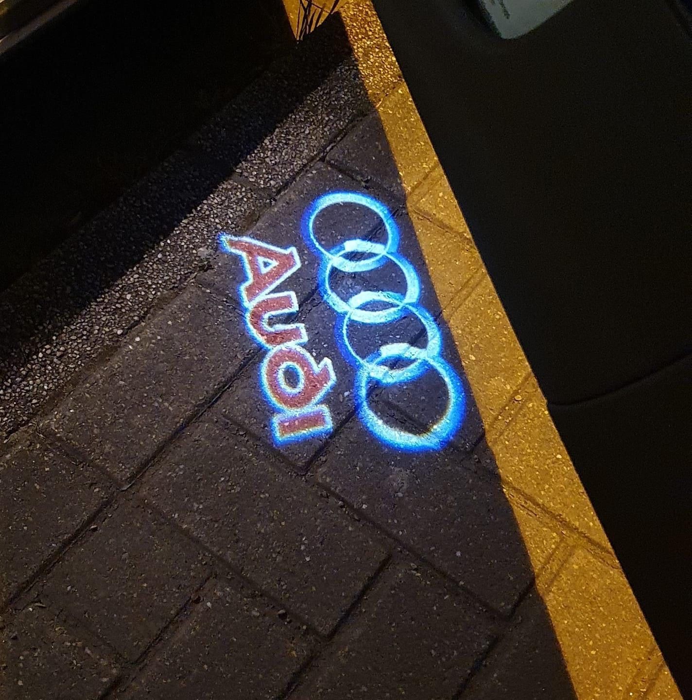 Customer photo review of AUDI  Original LOGO PROJECTOT LIGHTS Nr.009 (quantity 1 = 2 Logo Films /2 door lights）