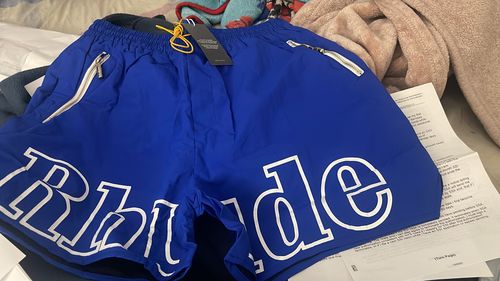 Customer photo review of RHUDE 3M Reflective Letters Mesh Drawstring Shorts