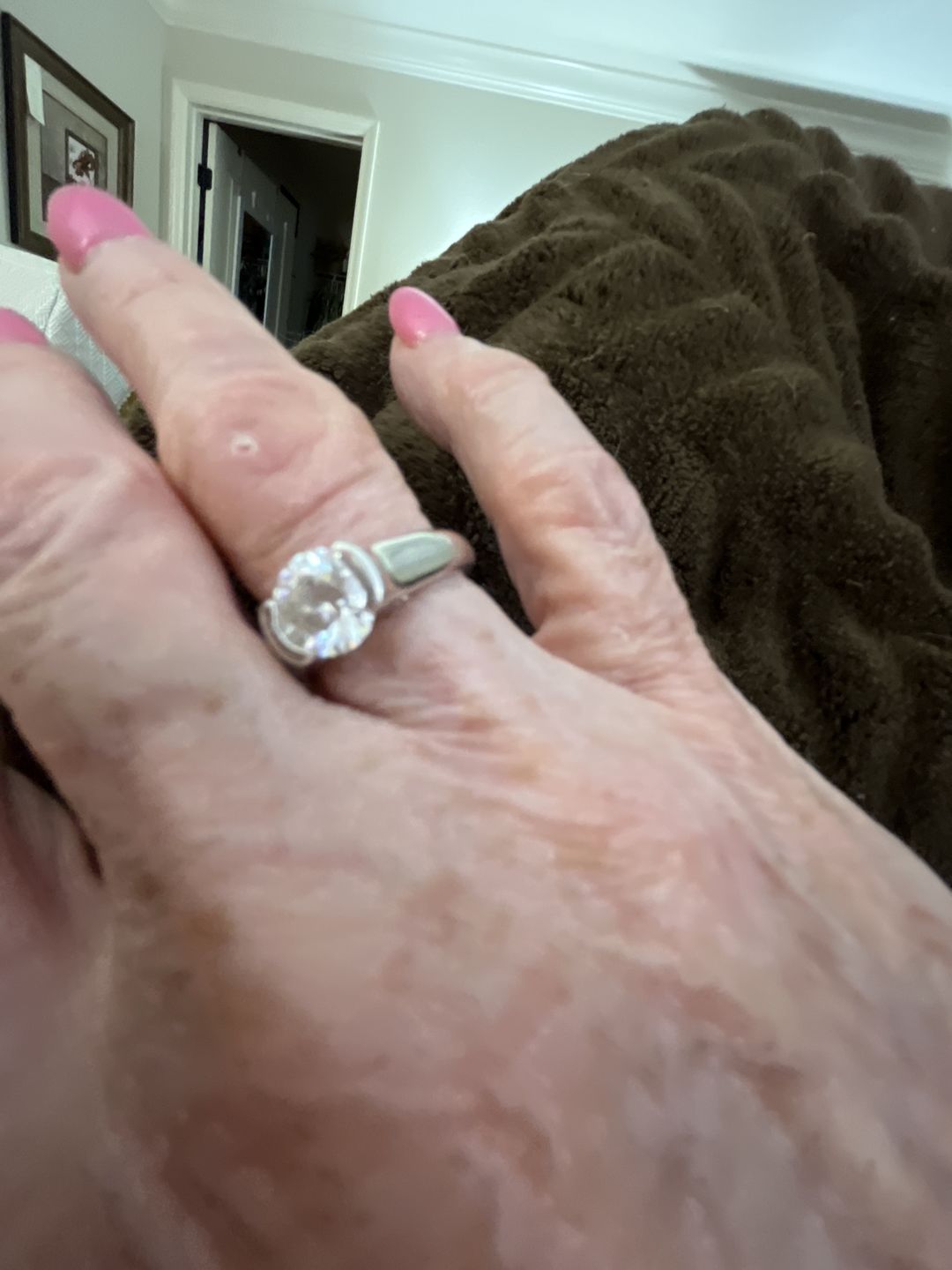 Customer photo review of Solitaire Moissanite Half Bezel Set Sterling Silver Engagement Ring