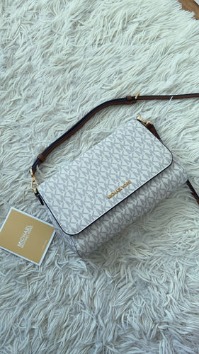 Customer photo review of Medium Logo Convertible Crossbody Bag (VANILLA)