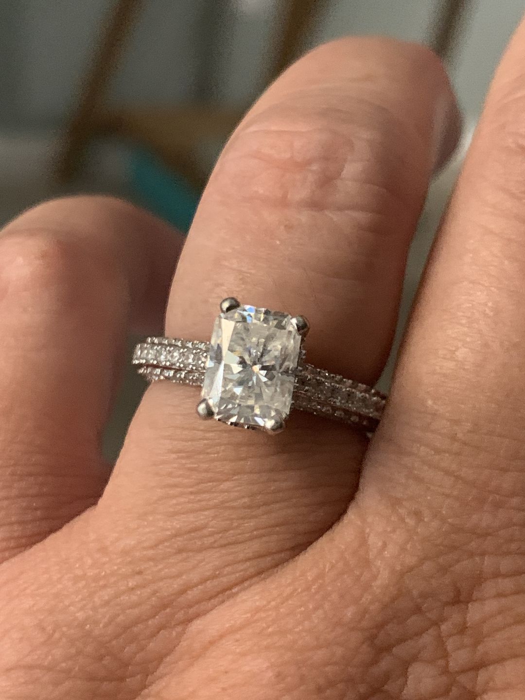 Customer photo review of Hidden Halo Radiant Moissanite Triple Row Pave Engagement Ring