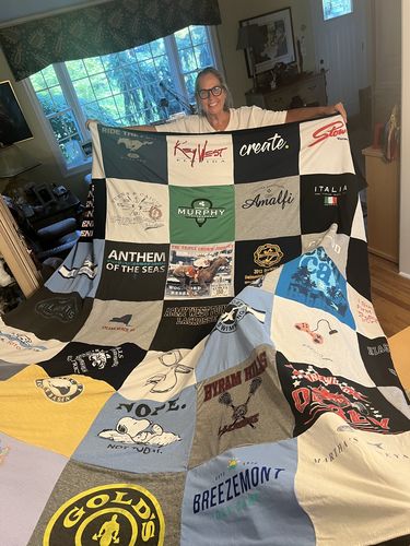 T-shirt quilt with travel, fashion themes by Cheryl from NY