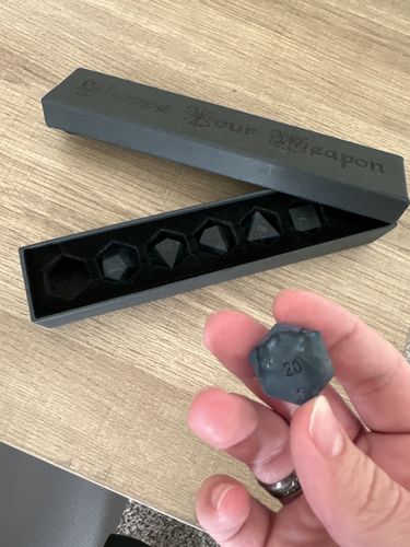 Customer photo review of Raised Dark Blue Lightning Glass DnD D&D Dice Set