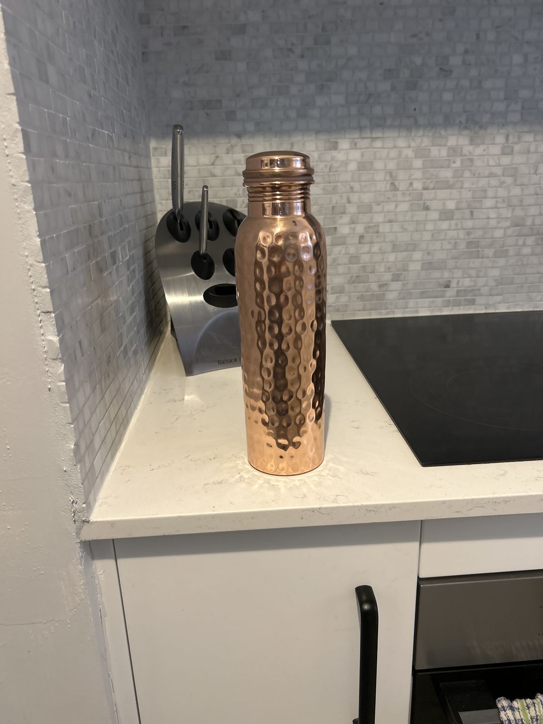 Customer photo review of Hammered Pure Copper Water Bottle