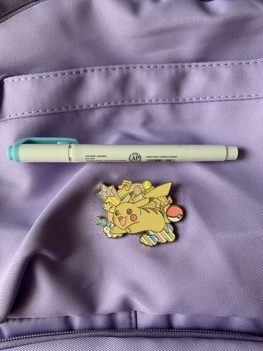 Customer photo review of Pikachu Enamel Pin
