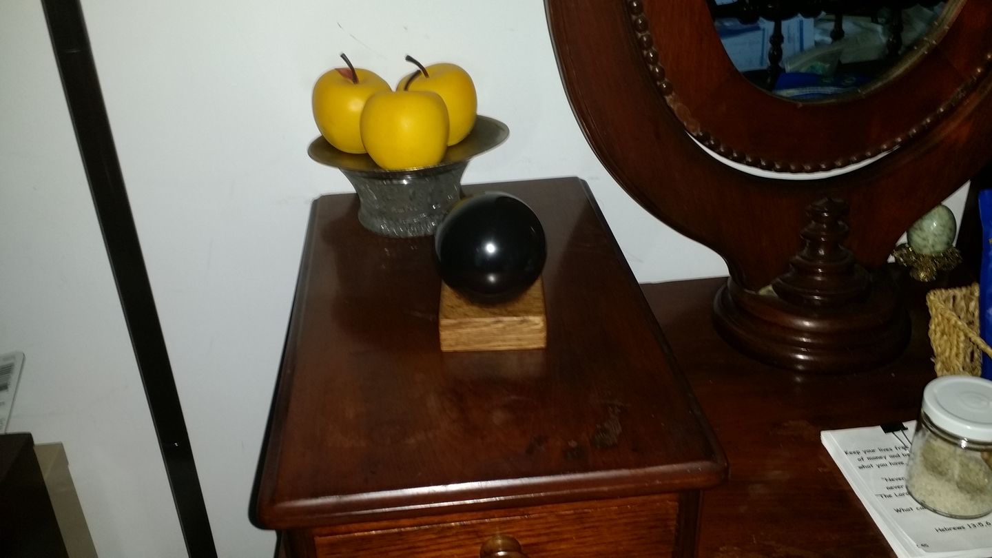 Customer photo review of Genuine Black Shungite Sphere | 75mm, 3 Inch, Custom Mahogany Stand