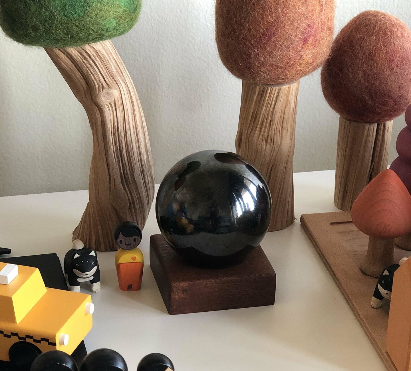 Customer photo review of Genuine Black Shungite Sphere | 75mm, 3 Inch, Custom Mahogany Stand