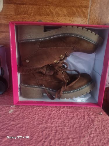 Reseña con foto de un cliente sobre Botas Maite