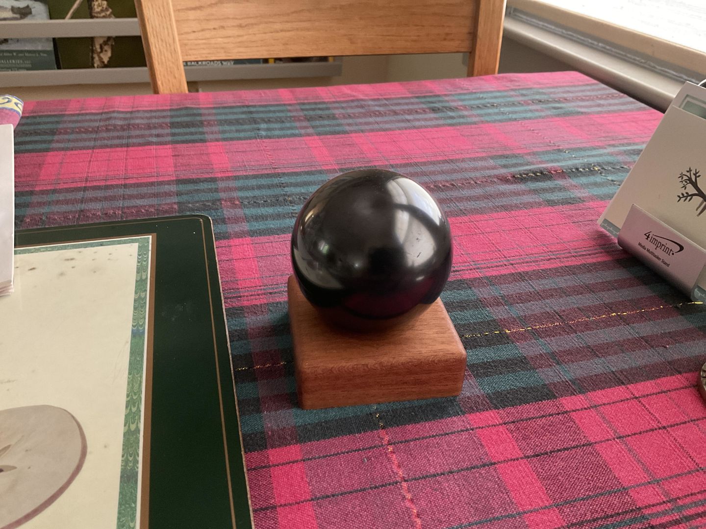 Customer photo review of Genuine Black Shungite Sphere | 75mm, 3 Inch, Custom Mahogany Stand