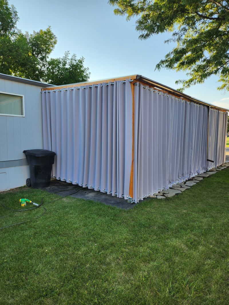 Customer photo review of Top & Bottom Grommet Windproof Outdoor Curtains for Patio 1 Panel