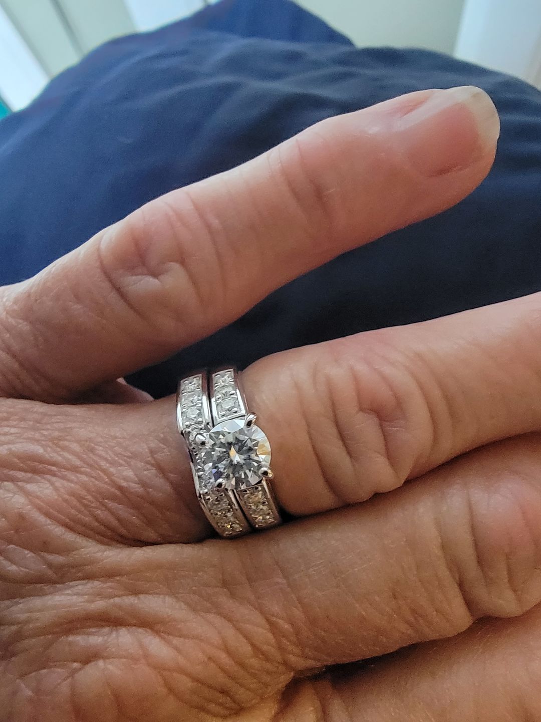 Customer photo review of Round Moissanite Channel Set Accents Bridal Engagement Ring Set