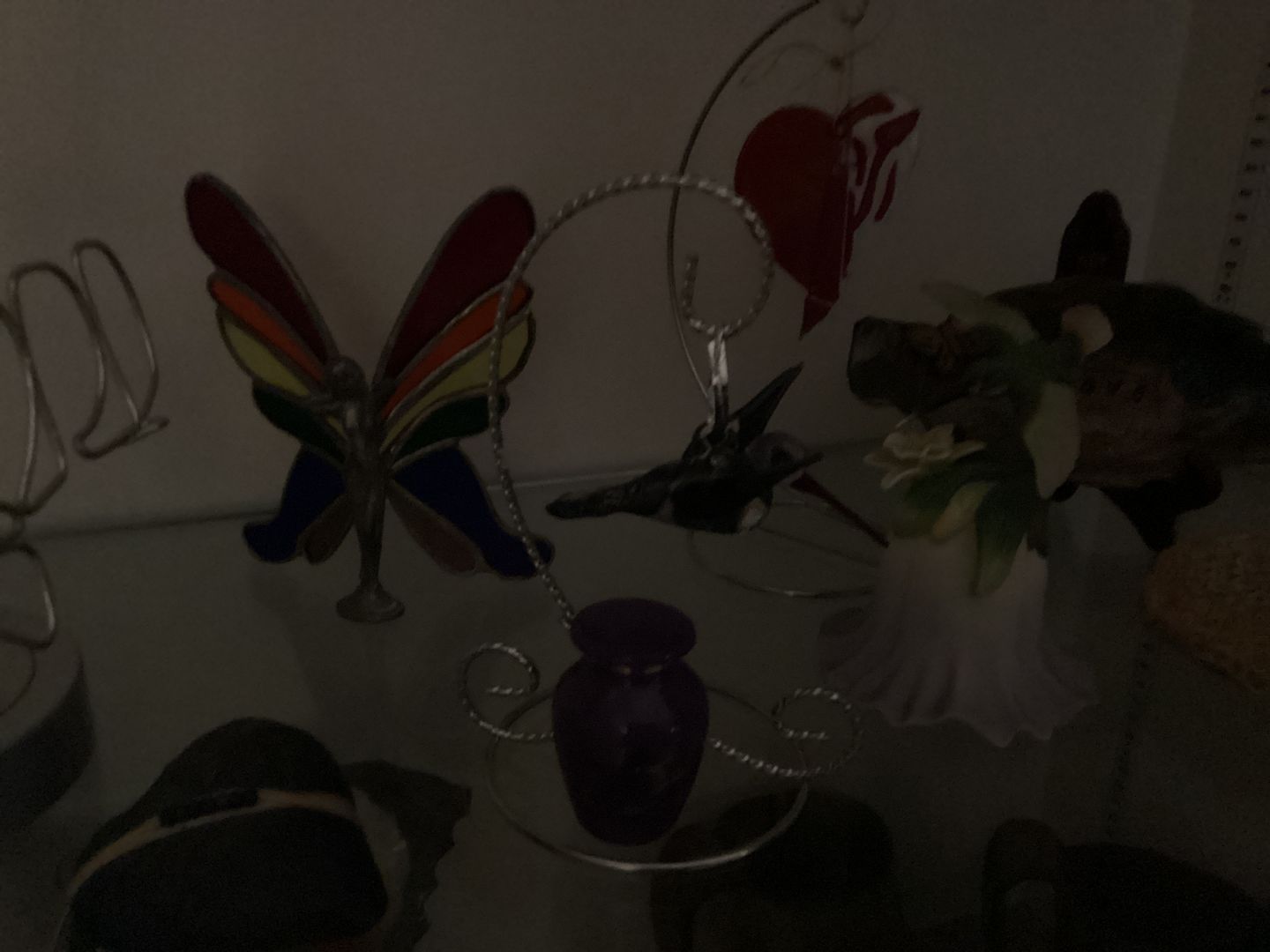 Customer photo review of Purple Dichroic Twist Glass Hummingbird with Infused Ash