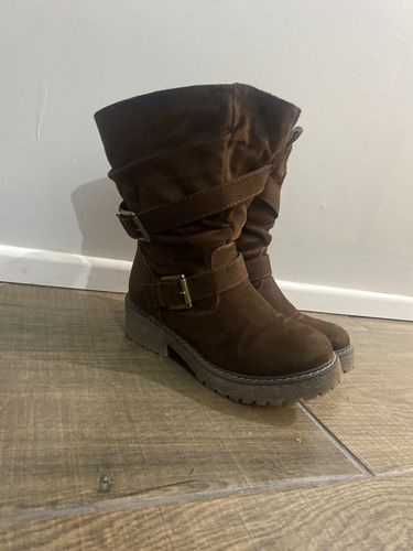 Reseña con foto de un cliente sobre Botas Estefany