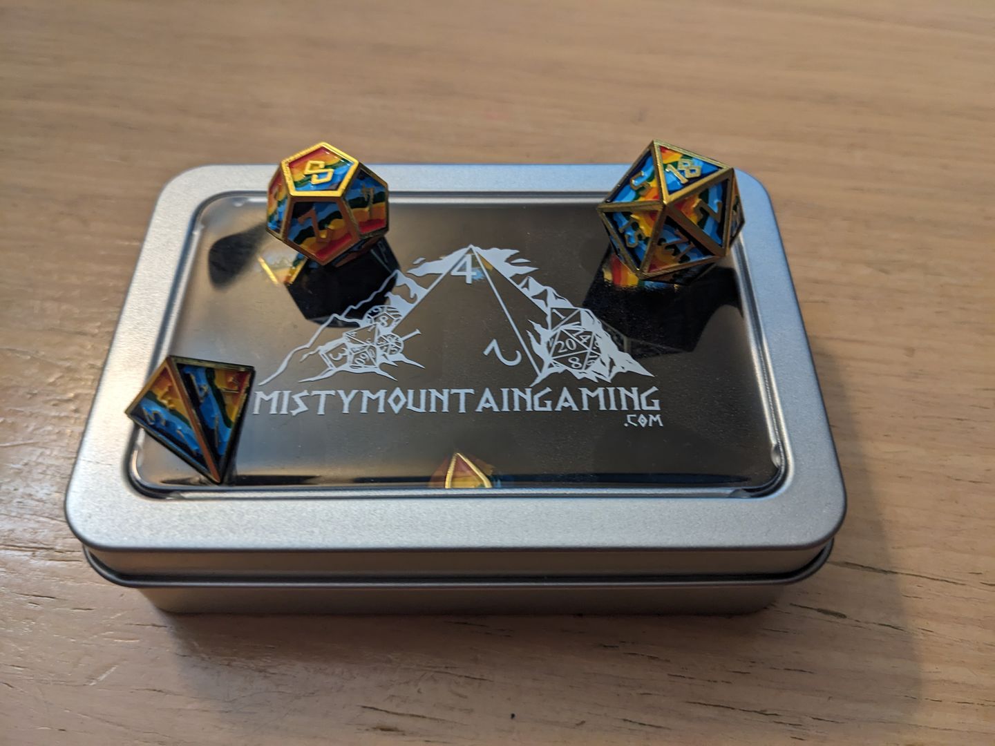 Customer photo review of Elder Runes Pride And Gold 7pc Polyhedral DND RPG Metal Dice Set