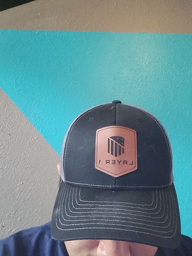 Customer photo review of Custom Leather Patch Trucker Hat - Richardson 112