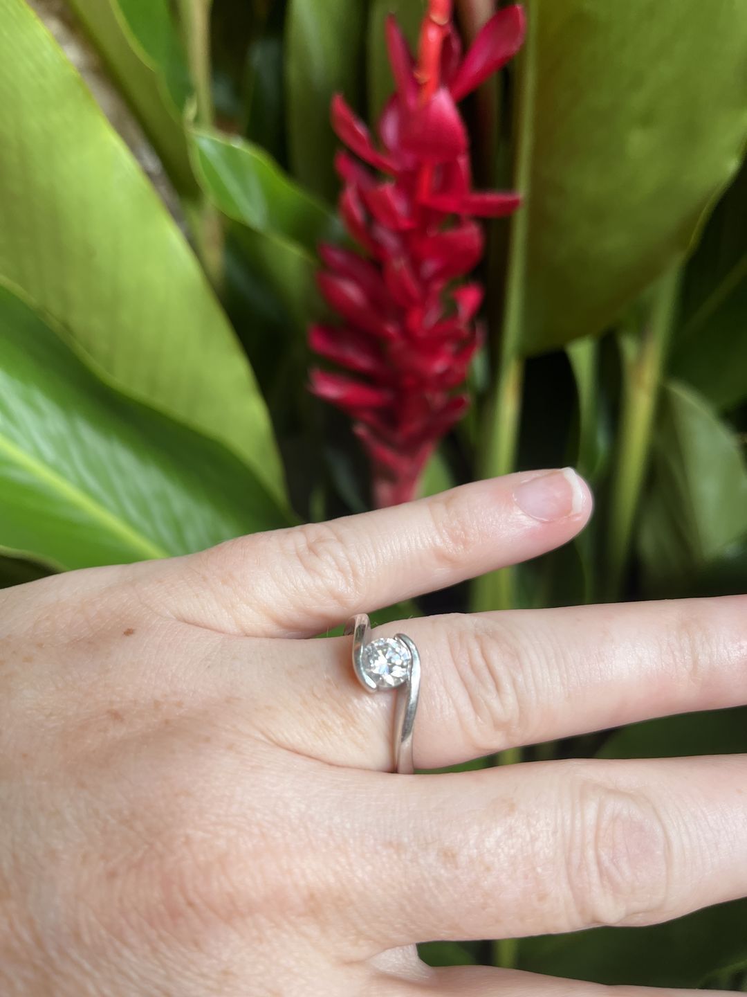 Customer photo review of Solitaire Tension Set Moissanite Bypass Engagement Ring