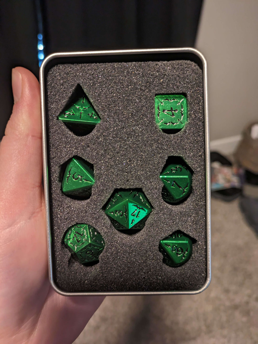 Customer photo review of SWORD OF THE EMERALD ISLES METAL DICE SET