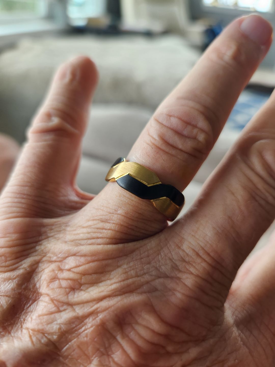 Customer photo review of Tungsten Black and Gold Infinity Knot Ring, Tungsten Rings for Men Wedding Band