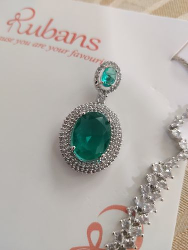 Customer photo review of Rubans Rhodium Plated Premium White & Emerald Solitaire Zircons Pendant Necklace Set