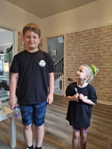 Customer photo review of Somebody's Feral Child Front & Back Graphic Tee