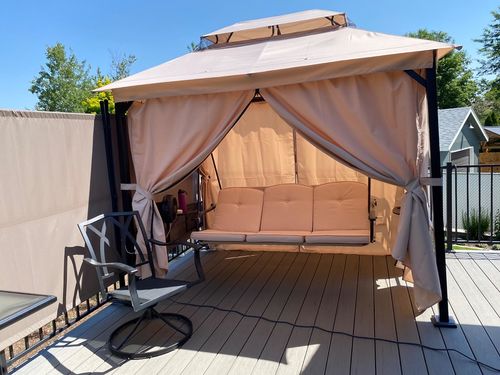 Customer photo review of Homrest 3-Seat Swing Chair,Outdoor Gazebo Swing,Porch Swings Outdoor with Double Tier Canopy,Netting Curtains,Side Trays,for Graden,Poolside Backyard(Khaki)