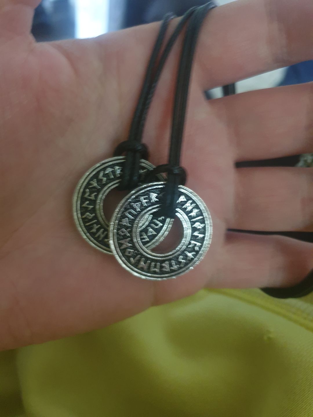 Customer photo review of Runed Coin Pendant
