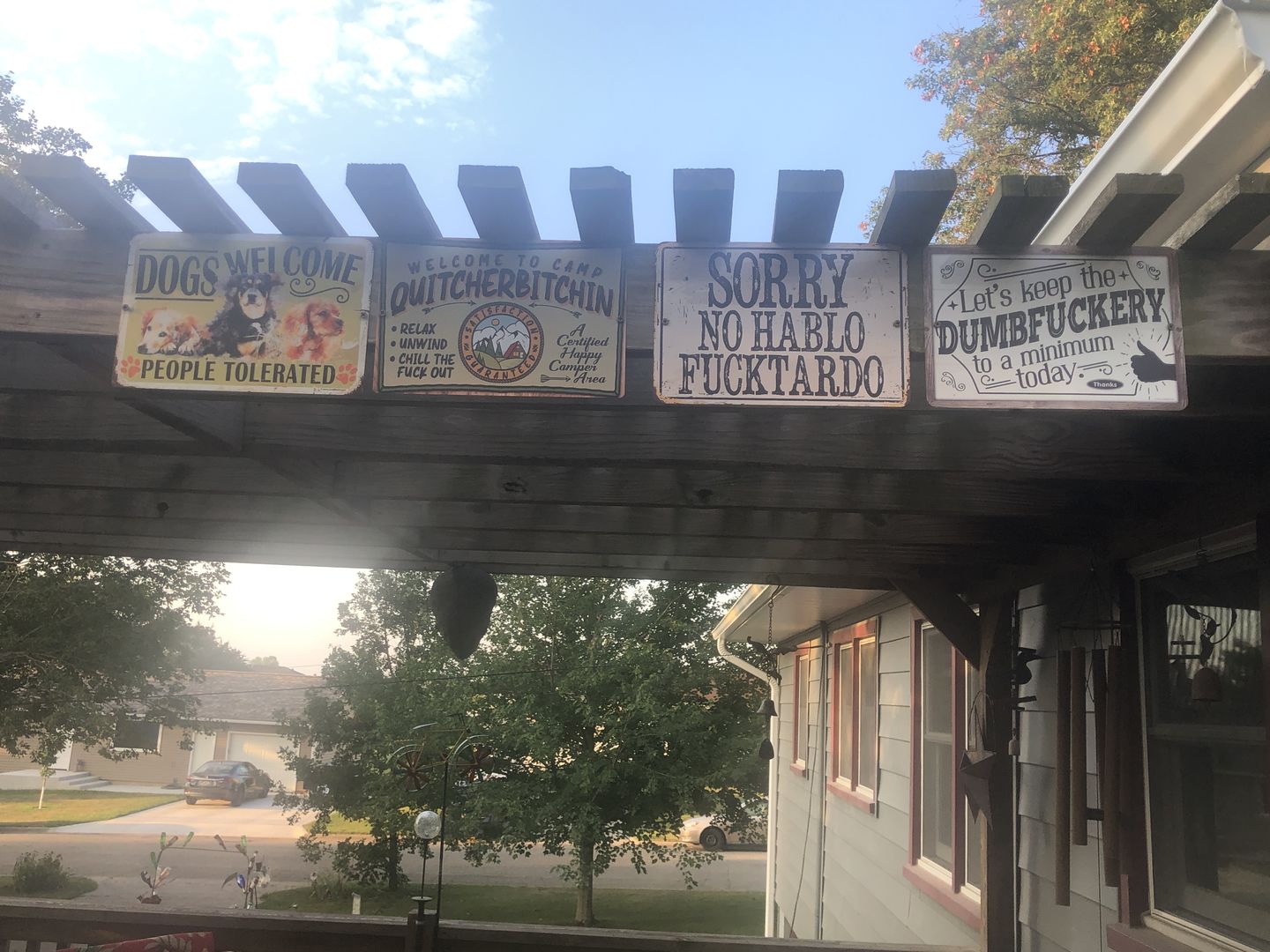 Customer photo review of Dogs Welcome People Tolerated - Metal Sign